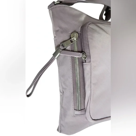 TUMI Voyageur Tyler Crossbody Organizer Pockets Bag in Lilac - Picture 9 of 16